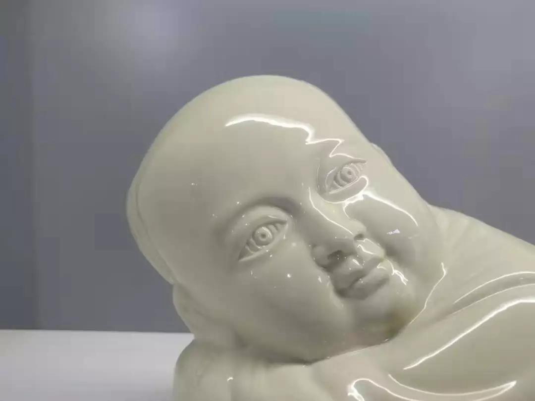 大宋定窯設計的孩兒枕的局部 大宋定窯設計的孩兒枕的局部